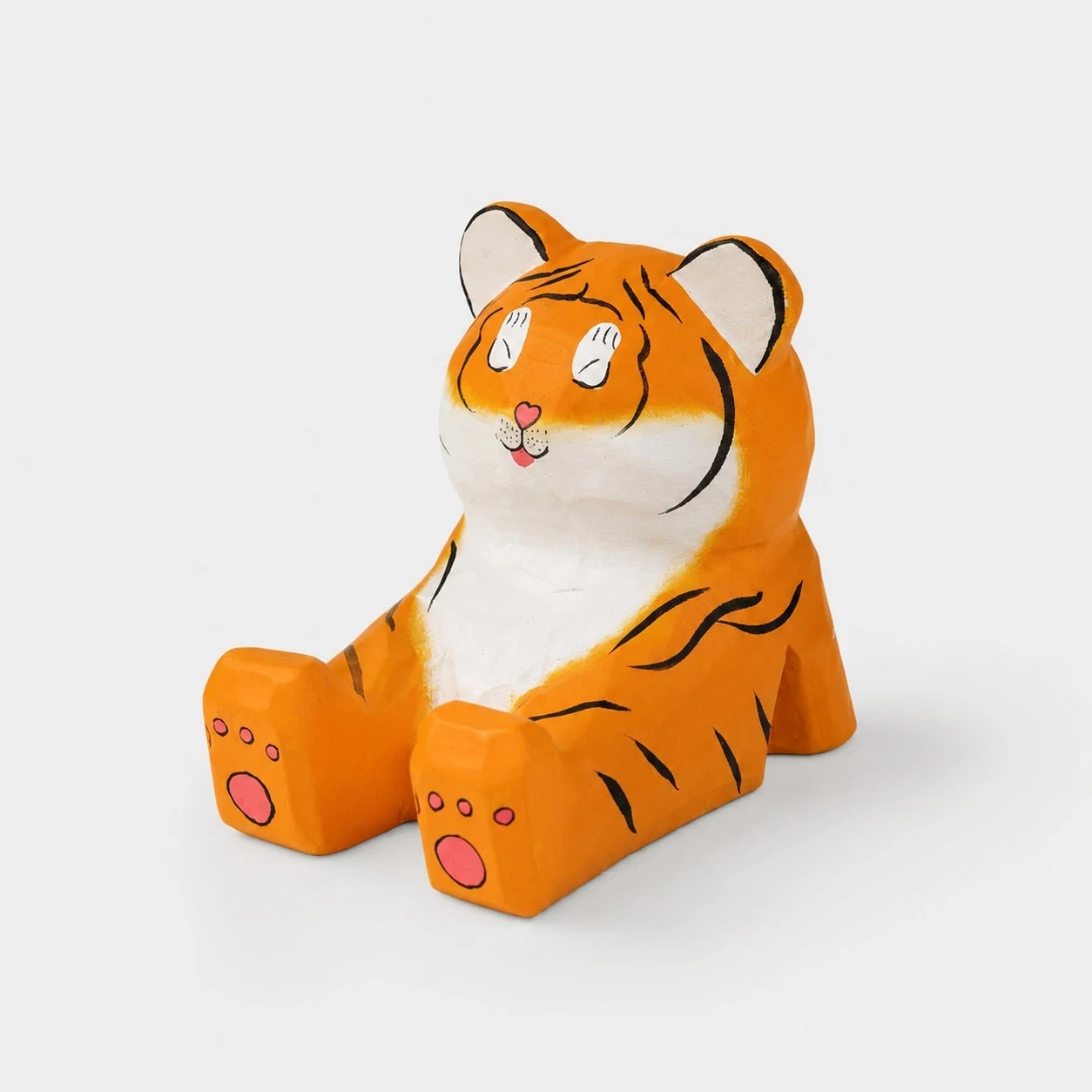 Hand-carved wooden animal phone stand