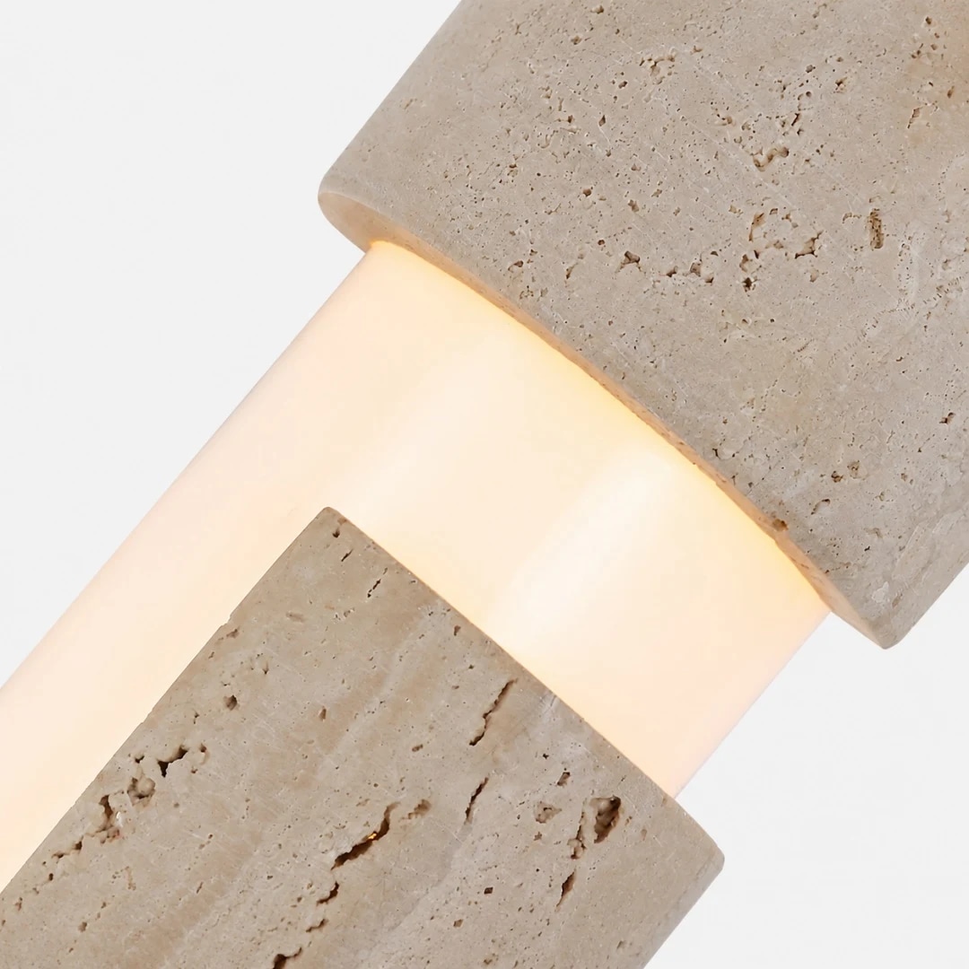 Warm acrylic diffuser and yellow travertine stone texture close view